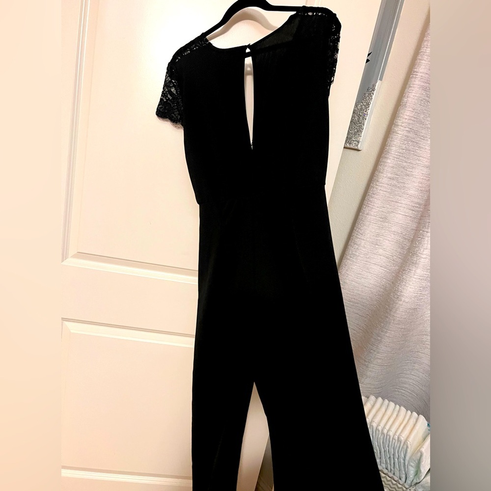 Fashion nova black lace jumpsuit size XL (NWT)